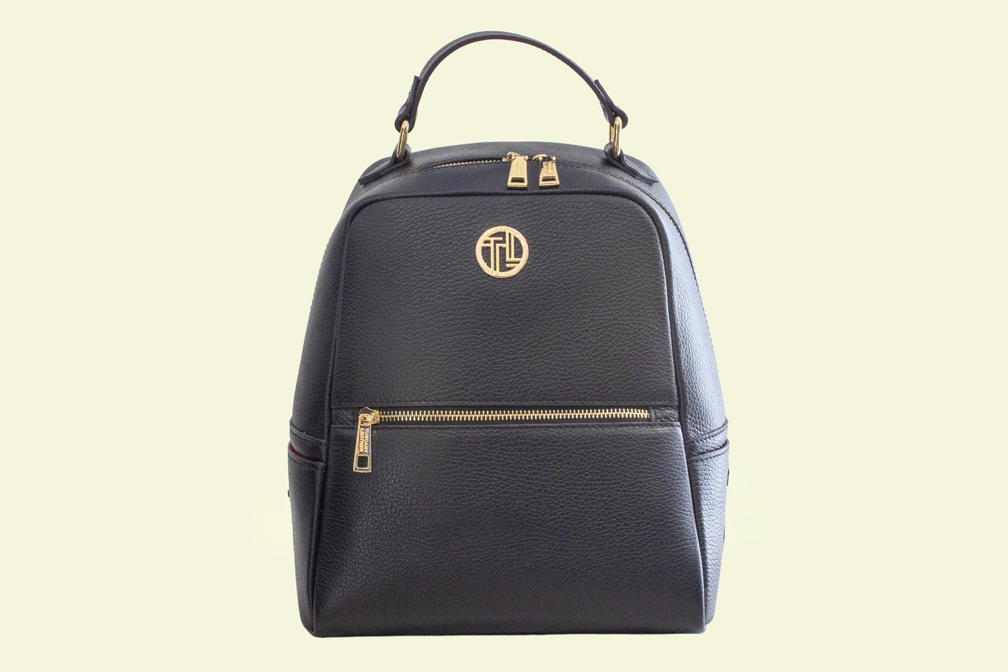 Sac à dos PRISMA noir en cuir italien vue de face avec logo doré