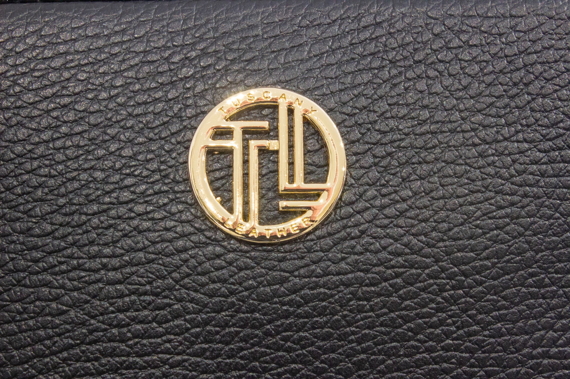 Sac à dos PRISMA détail logo doré rond