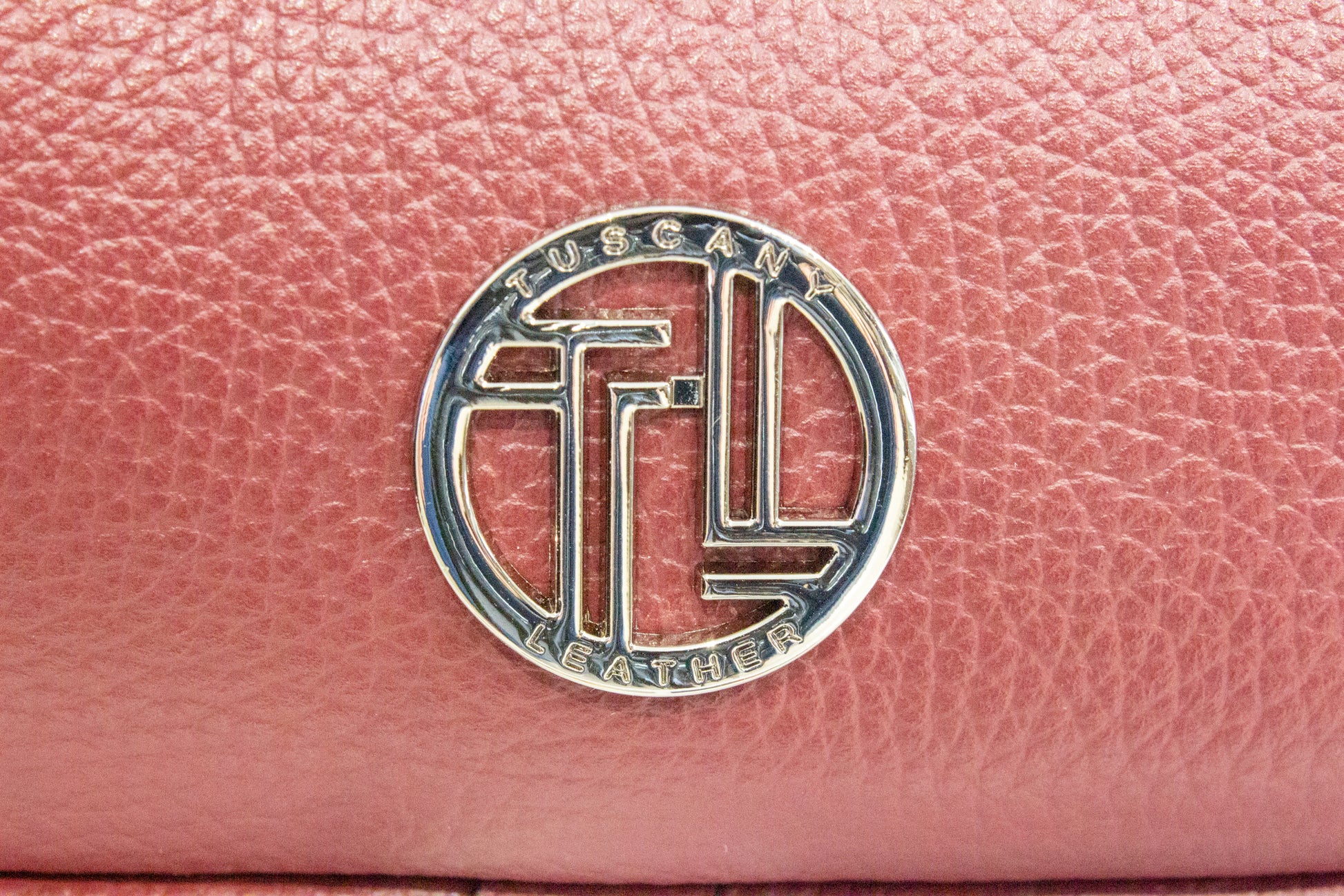 Sac à main MICHELLE détail logo doré rond sur cuir bordeaux